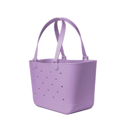 Soft lavender purple tote bag displayed against white background with subtle shadow details