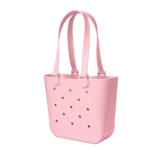 Soft pastel pink tote bag with mauve ventilation holes and matching pink handles