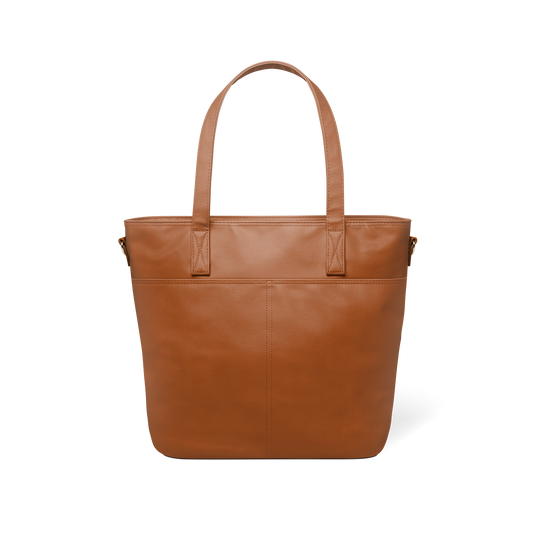 Back view of cognac brown leather tote bag in medium to dark tan shade, showing structured silhouette and craftsmanship details of this sophisticated, earthy-toned accessory.