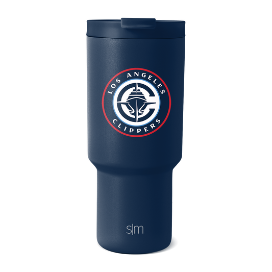 Deep navy blue LA Clippers tumbler with team logo featuring bright red circular ring and white details