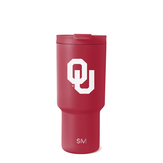 Deep burgundy red tumbler with white background