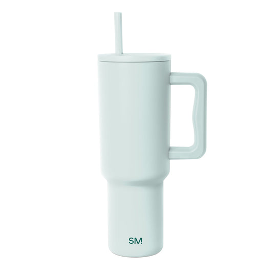 Sage green insulated tumbler with matching lid and straw, displayed on white background
