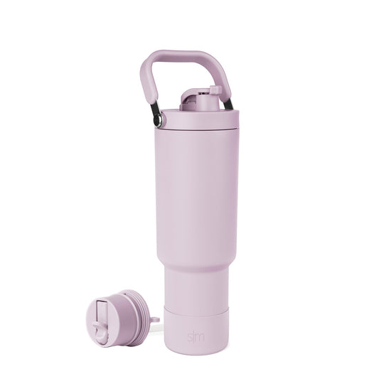 Soft mauve and lavender water bottle with matching handle and detachable base cap, featuring black accents.