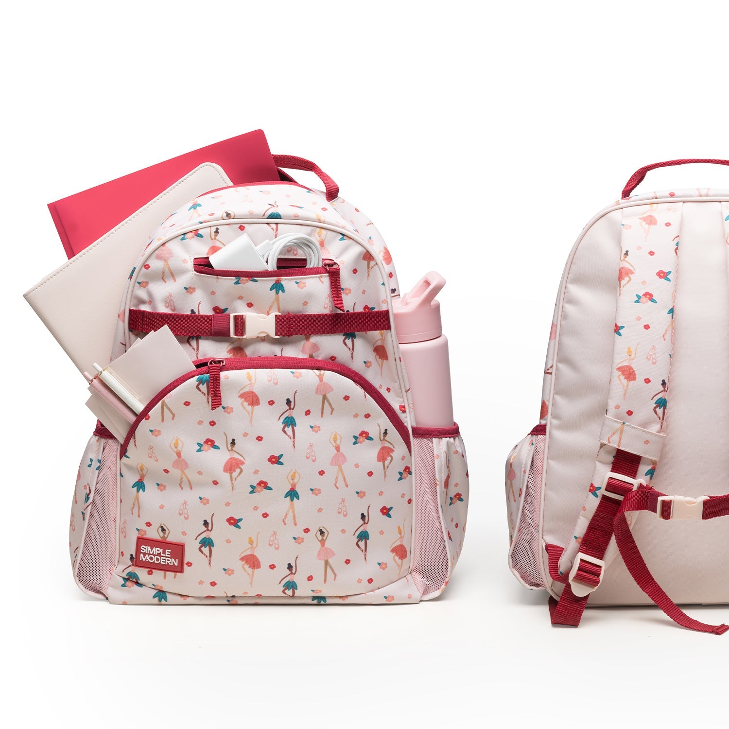 Cream-colored backpack with burgundy red and pink accents, featuring a geometric coral print design on the main body