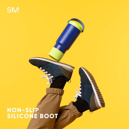 24oz Simple Modern water bottle with navy blue body and silicone boot stacked on bright yellow background
