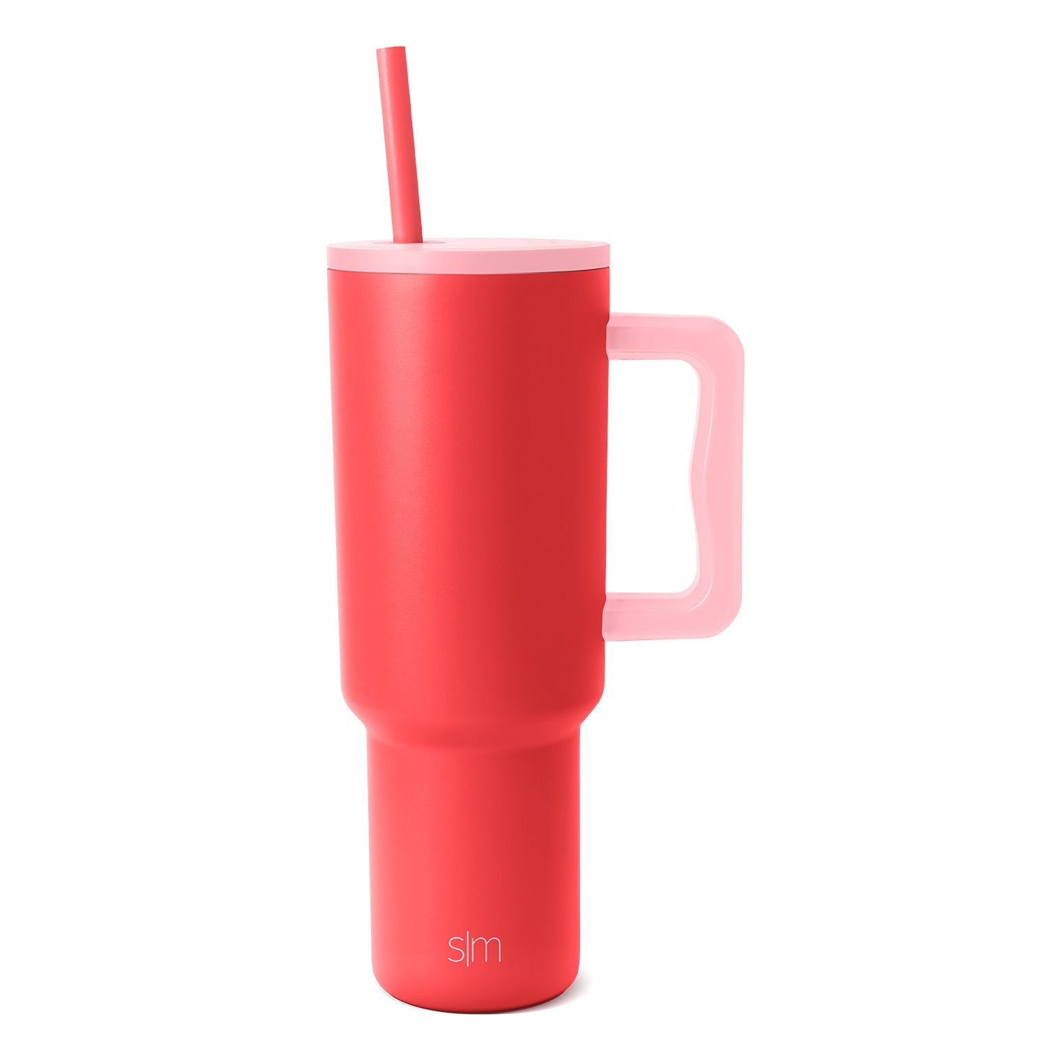 Coral red insulated tumbler with soft pink lid, matching straw, and pink-accented handle rim