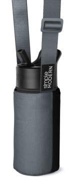 Gray neoprene cylindrical bottle carrier with black band on white background