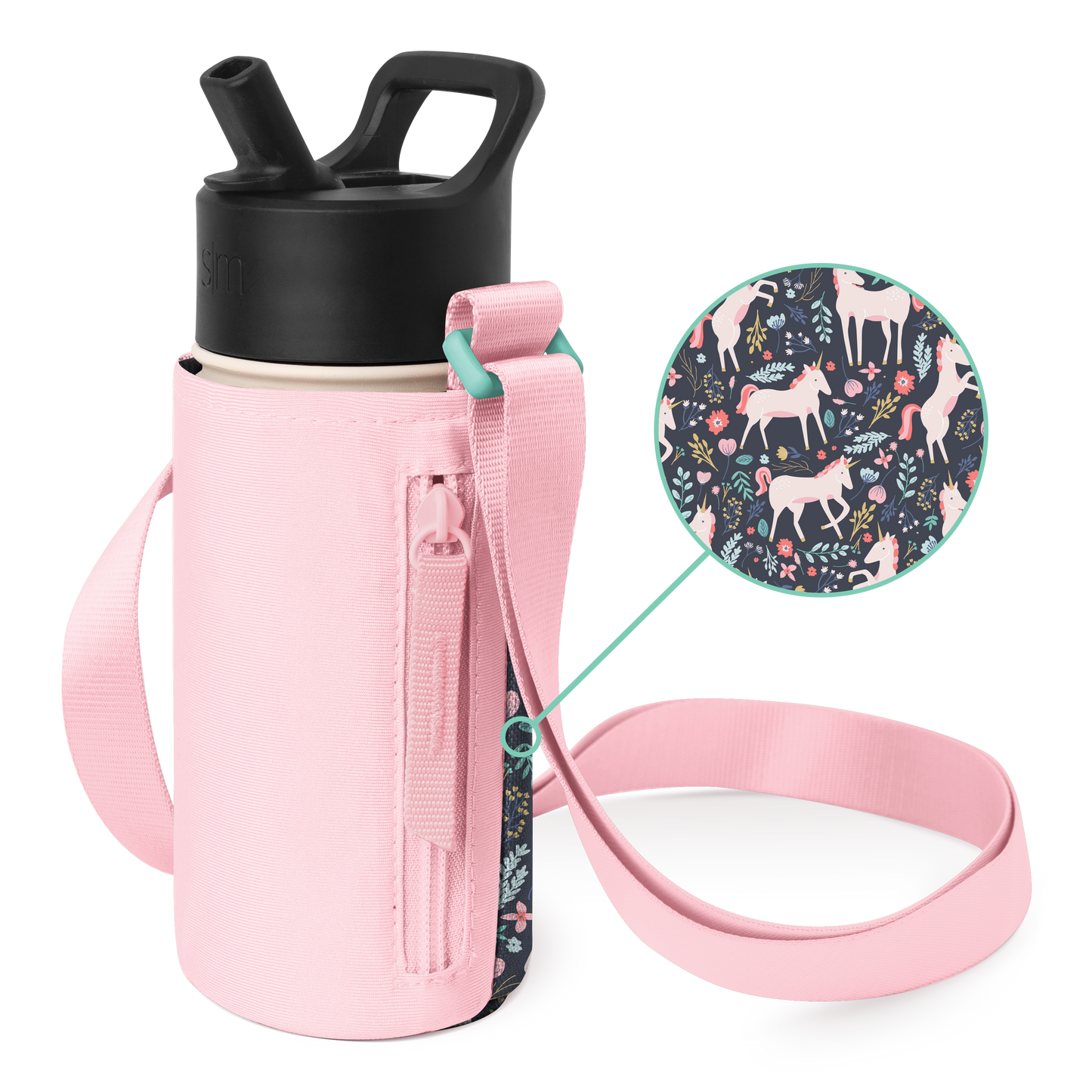 Soft pink bottle carrier with shoulder strap, holding a matte black water bottle with cream-colored base accents