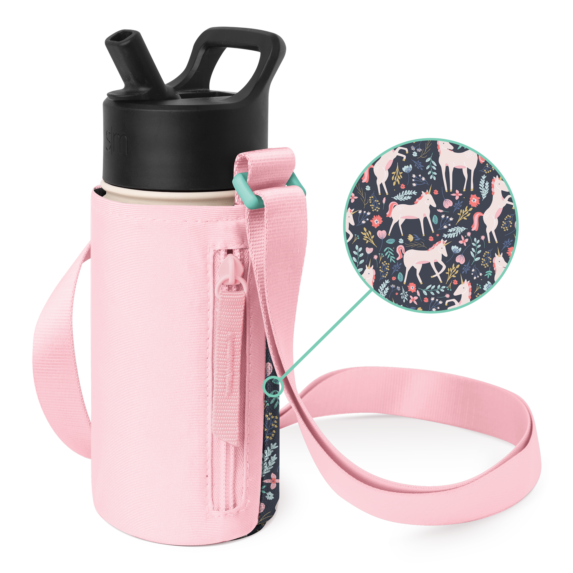Soft pink bottle carrier with shoulder strap, holding a matte black water bottle with cream-colored base accents