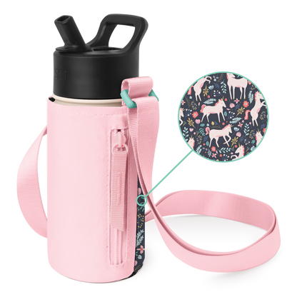 Soft pink bottle carrier with shoulder strap, holding a matte black water bottle with cream-colored base accents
