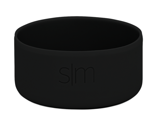 Black matte boot displayed against a light gray background