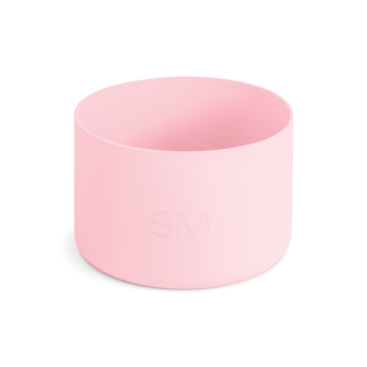 Pale pink cylindrical drinkware accessory on white background