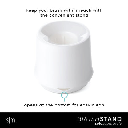 White cylindrical bottle brush stand with compartments, turquoise circular opening at bottom, on white background