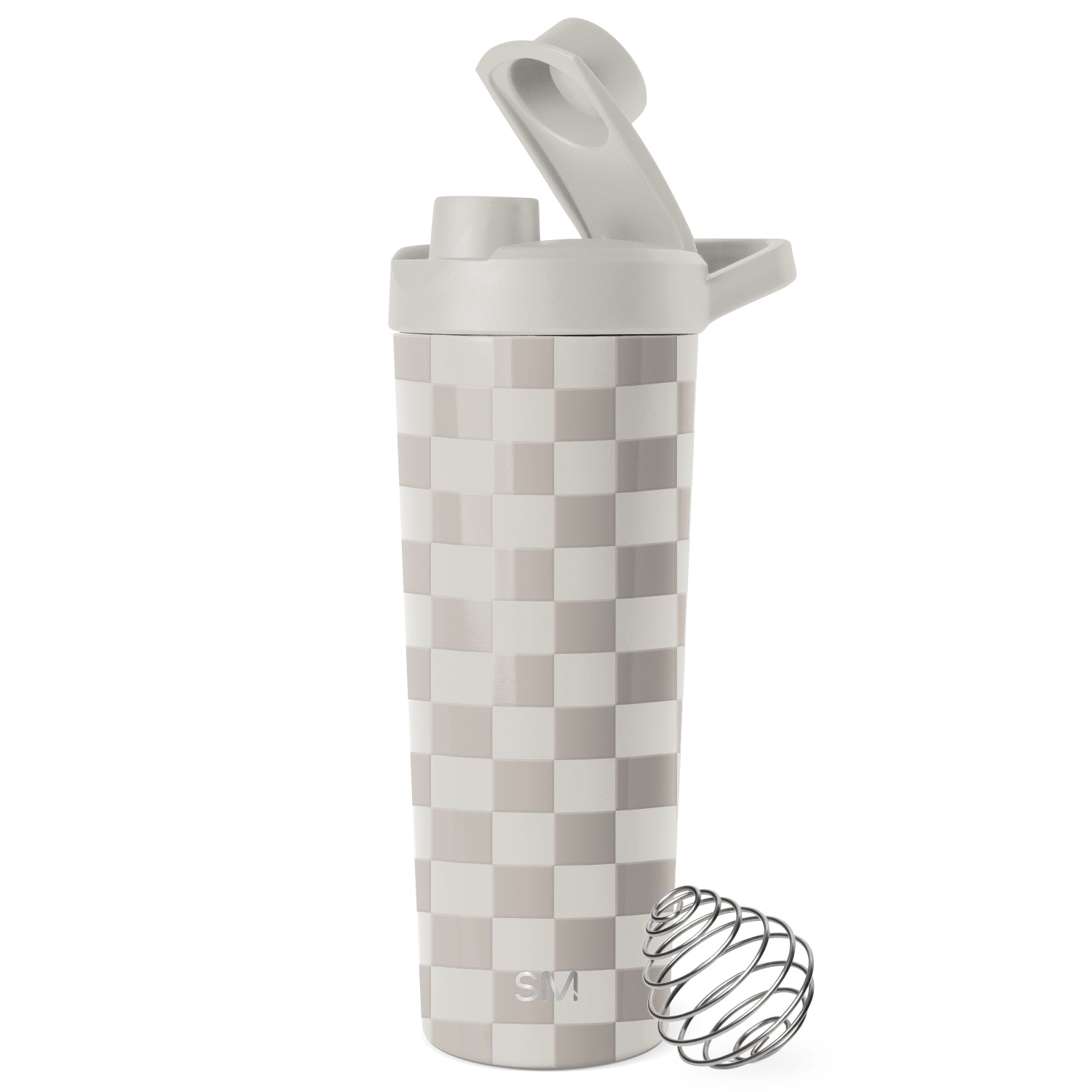 Beige and cream ceramic shaker with white lid on neutral background