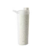 White insulated tumbler with lid displayed against a neutral background