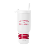 White insulated tumbler with crimson red horizontal stripes on lower section and metallic silver accents