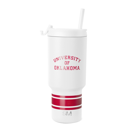 White insulated tumbler with crimson red horizontal stripes on lower section and metallic silver accents