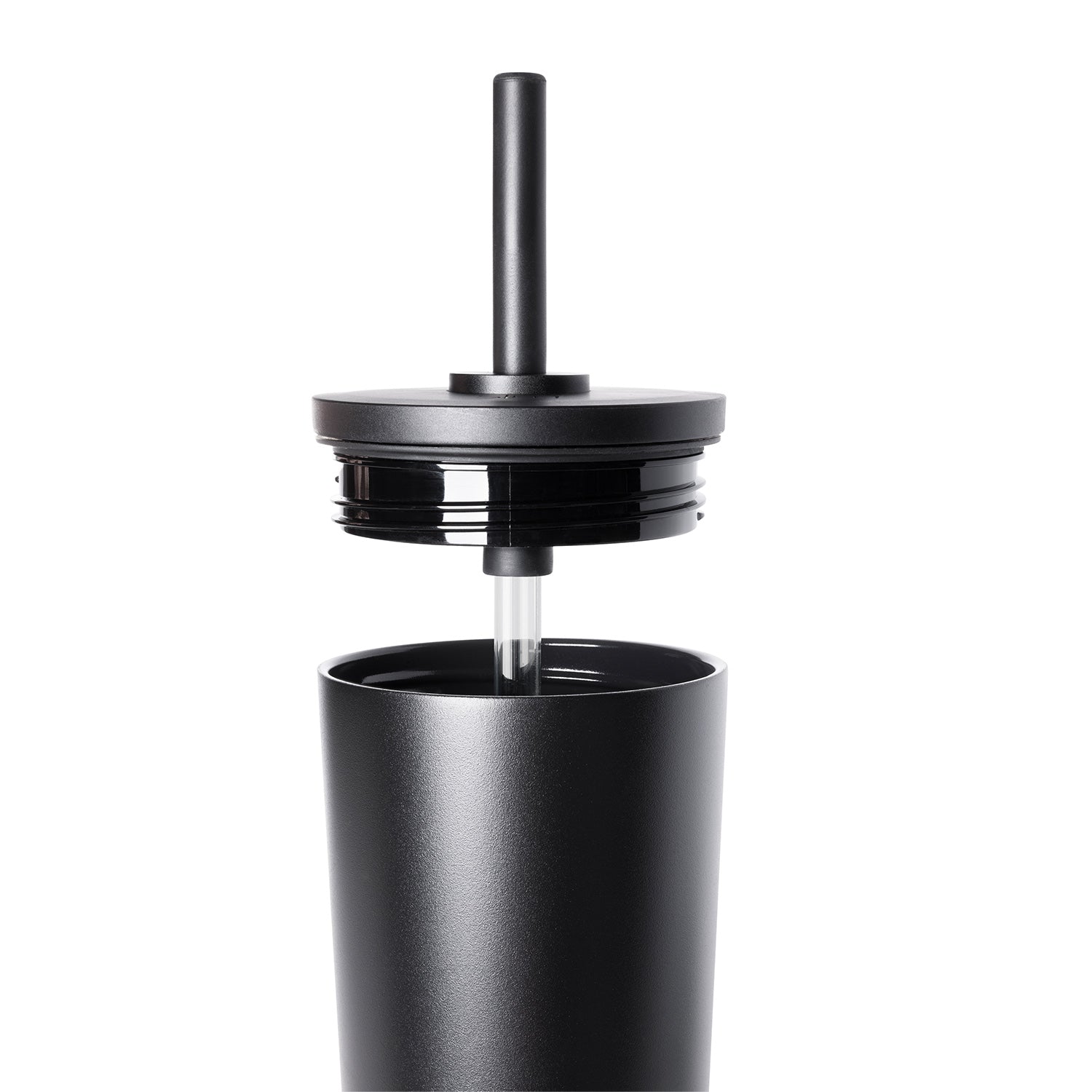 Matte black insulated drinkware with white lid shown against white background.