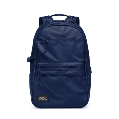 Navy blue backpack on white background