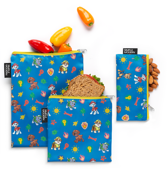 Three bright blue pouches of ESB LMS V PAW OTA M product with red, yellow, and orange bell peppers displayed at the top against a warm brown background.