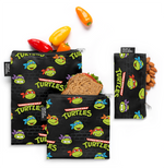 Teenage Mutant Ninja Turtles character illustration with bright lime green text and faces on black background