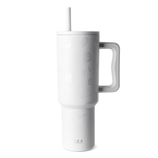 White stainless steel tumbler with matching white straw on light gray background