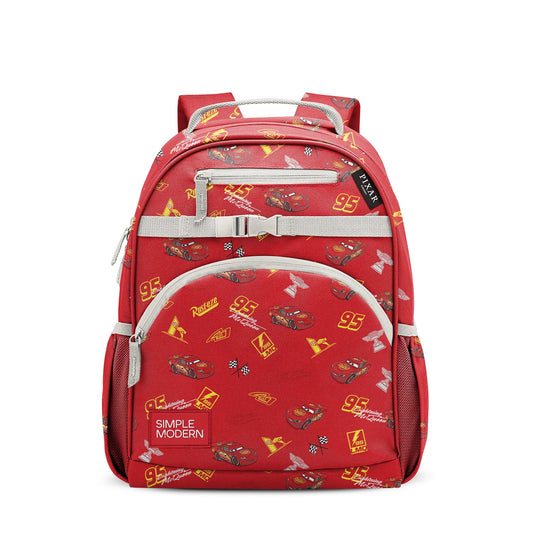 Red children's backpack with yellow racing graphics and gray webbing straps, featuring front zipper pocket, mesh side pockets, padded shoulder straps, and top carry handles.