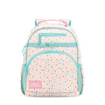 Pale pink children's backpack with turquoise trim, colorful confetti pattern, front pocket with "SIMPLE MODERN" label, padded shoulder straps, side mesh pockets, and compression strap. Studio product shot on white background.