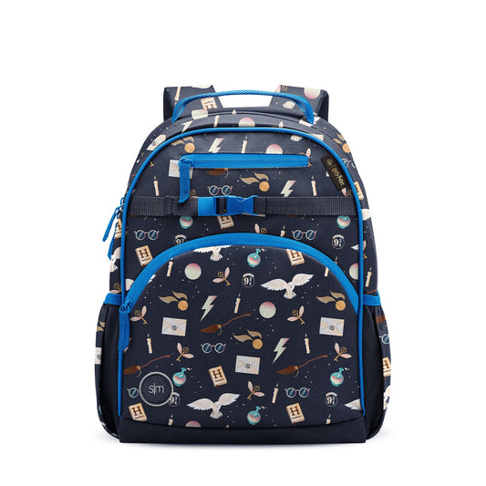 Navy blue children's backpack with bright blue accents, cream and pink Harry Potter-themed pattern. Features front zippered pocket, side mesh pockets, padded blue straps, grab handles, and SM logo badge.