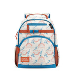Cream and blue Superman backpack with orange handles and chest strap, featuring scattered Superman text and illustrations, dual padded shoulder straps, front zippered pocket, and Simple Modern brand label on white background.
