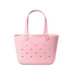 Soft pale pink tote bag with mauve perforated detailing across the front for subtle contrast