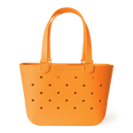 Orange tote bag with perforated ventilation holes, dual handles, and "Simple Modern" branding on white background.