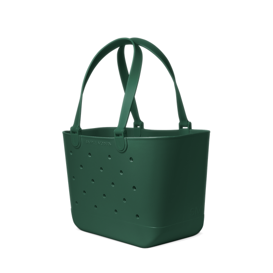 Deep forest green tote bag with white background, featuring minimalist design elements