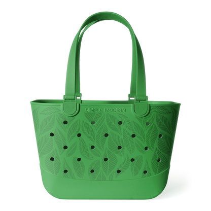 Green bucket tote bag with tropical leaf pattern and perforated details, featuring sturdy handles and "Simple Modern" branding on white background.