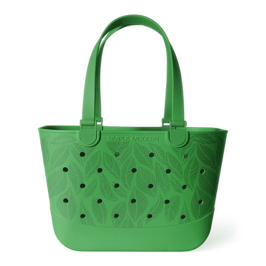 Green bucket tote bag with tropical leaf pattern and perforated details, featuring sturdy handles and "Simple Modern" branding on white background.
