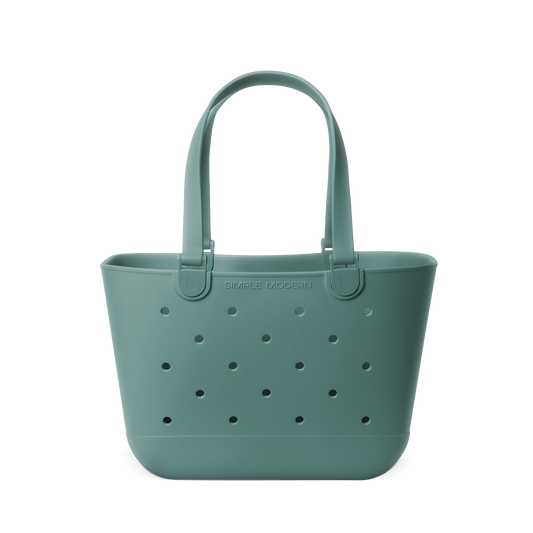 Soft sage green tote bag with matching handles and structural elements