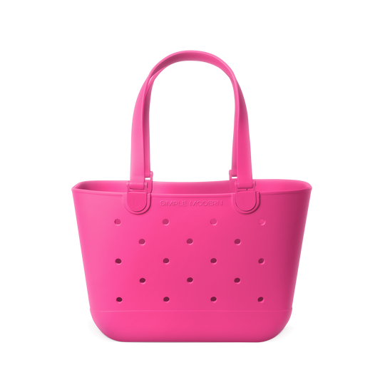 Vibrant hot pink tote bag displayed against a white background