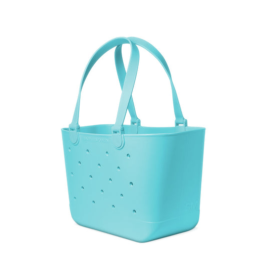 Turquoise perforated tote basket with curved handles and "SIMPLE MODERN" branding, displayed against white background.