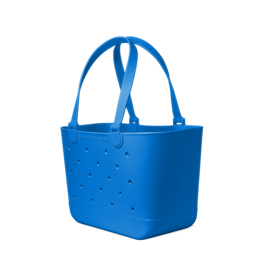 Electric blue geometric shape on white background with matte finish
