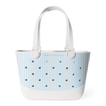 Light blue and white striped tote bag with white handles, metal grommets across the front, and "SIMPLE MODERN" branding, photographed against a white background.
