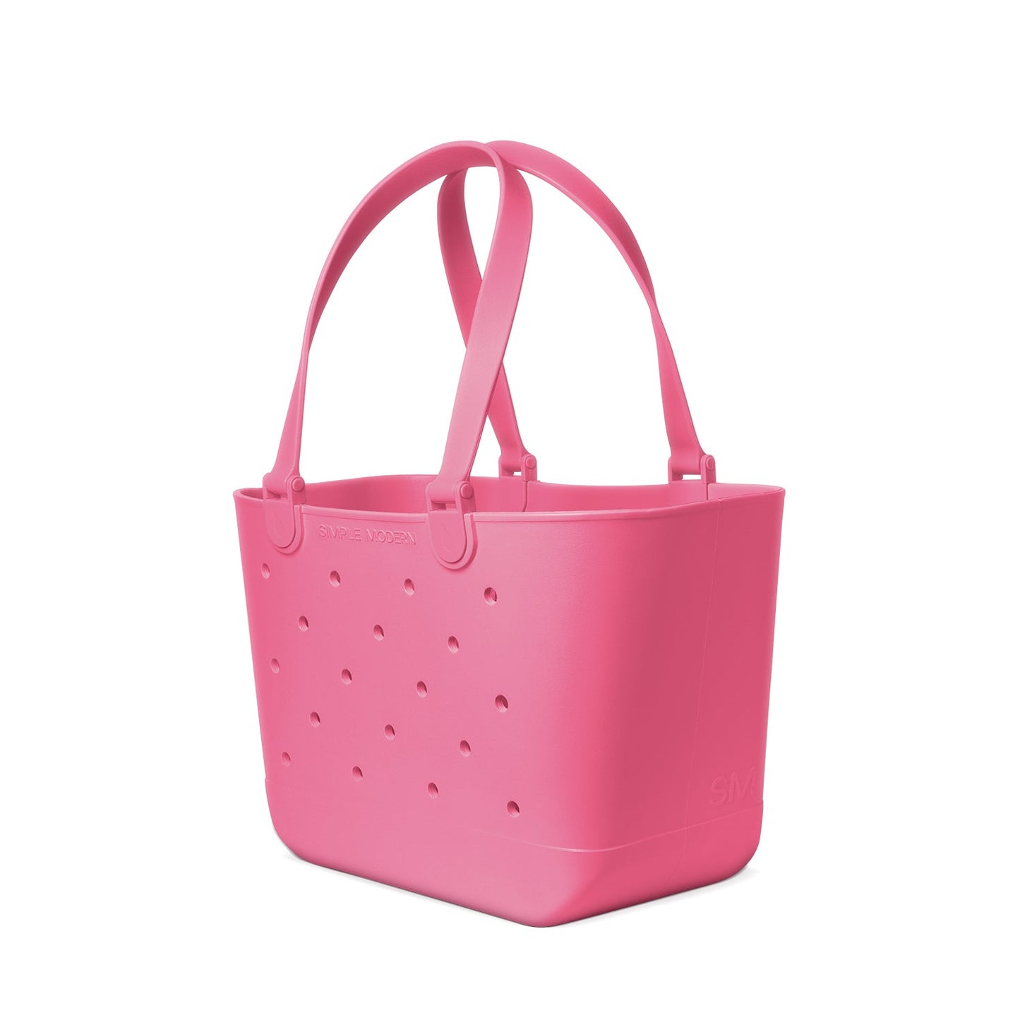 Bright hot pink silicone tote bag with rounded rectangular shape, squared-off bottom corners, and thick shoulder straps on white background.