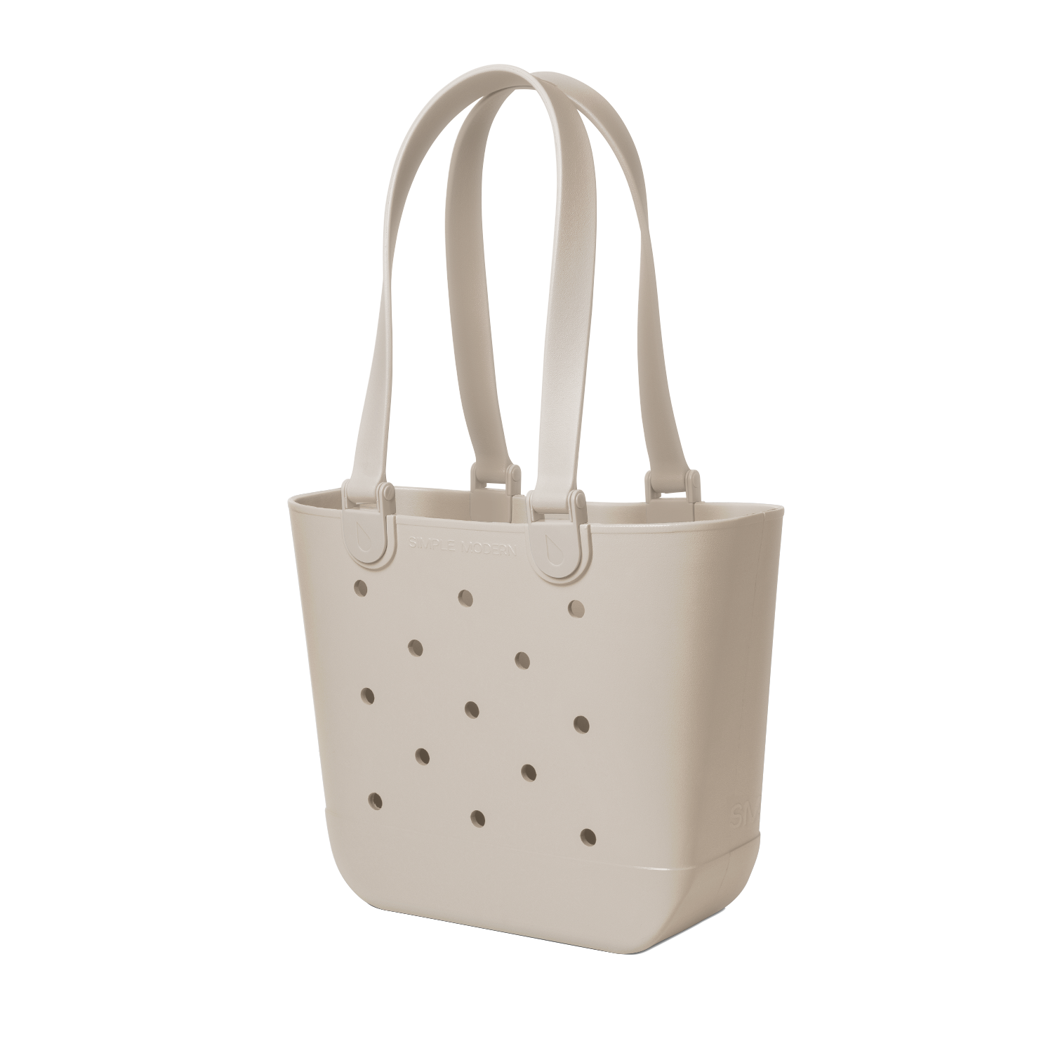 Cream-colored tote bag with handles and small circular perforations throughout the body, displayed on a neutral background.