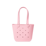 Soft pink tote bag against a white background