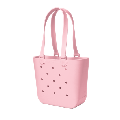 Soft pastel pink tote bag with mauve ventilation holes and matching pink handles