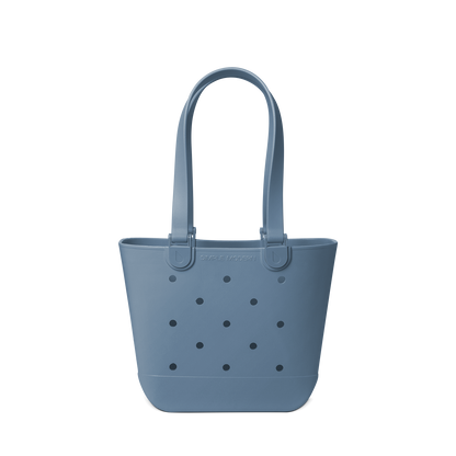 Soft blue-grey muted tote bag on light neutral background