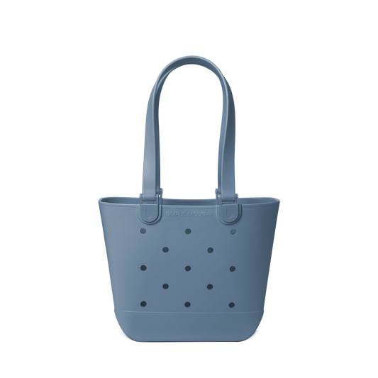 Soft blue-grey muted tote bag on light neutral background
