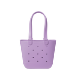 Soft lavender purple tote bag with decorative perforations in darker purple and gray tones on the front panel.