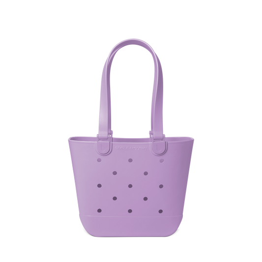 Soft lavender purple tote bag with decorative perforations in darker purple and gray tones on the front panel.