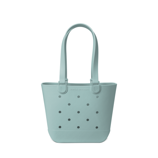 Soft sage green tote bag with matching handles and subtle dark gray accents