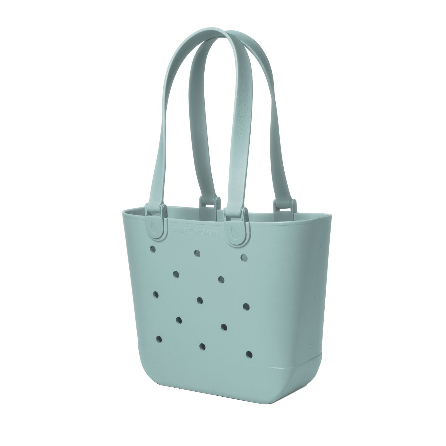 Soft sage green tote bag with small dark gray circular details, viewed from front